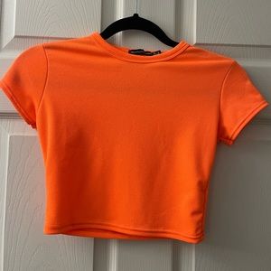 Bright orange crop top